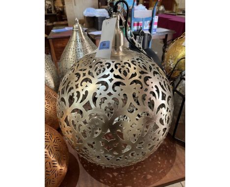 A globular pierced steel hanging lamp. 19' high. Emporio Arts