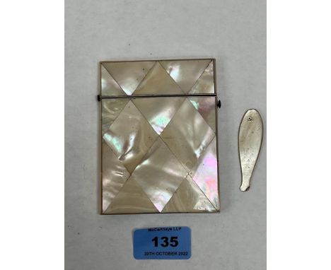 A 19th century mother-of-pearl parquetry card case and a mother-of-pearl fish gaming counter