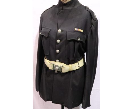 Post War British Police dress tunic with white leather belt (mannequin not included). P&amp;P Group 3 (£25+VAT for the first 