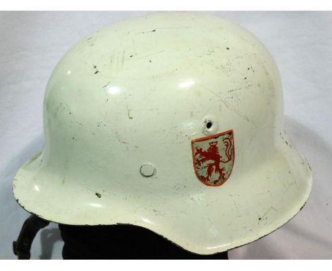 German WWII Fire or Police helmet in white, later applied decal with leather liner. P&amp;P Group 2 (£18+VAT for the first lo