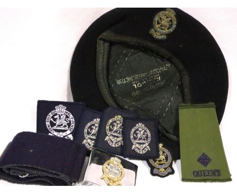 Queens Regiment beret, stable belt, epaulettes and uniform patches. P&amp;P Group 3 (£25+VAT for the first lot and £5+VAT for