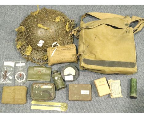 Mixed WWII and later field equipment including a Brodie helmet and net with dressing, gas mask etc. P&amp;P Group 2 (£18+VAT 