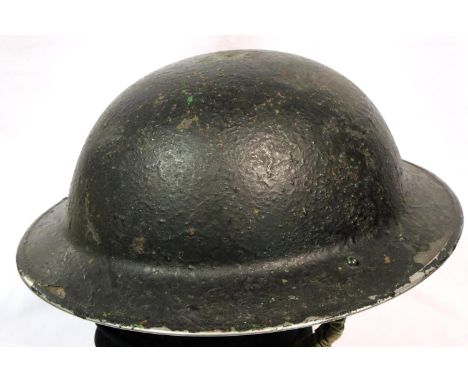 British WWII Warden or Police Brodie helmet in black, with canvas chin strap, lacking liner. P&amp;P Group 2 (£18+VAT for the