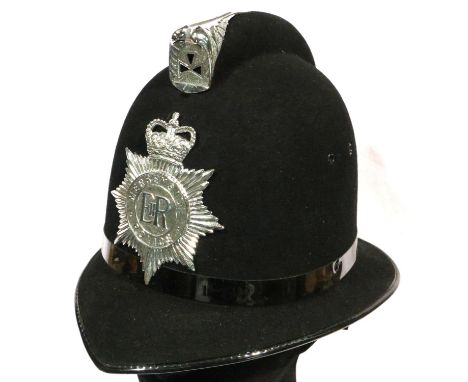 A modern Merseyside Police helmet by Christys London. P&amp;P Group 2 (£18+VAT for the first lot and £3+VAT for subsequent lo