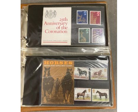 Seven albums of UK First Day Covers and Stamp Presentation packs