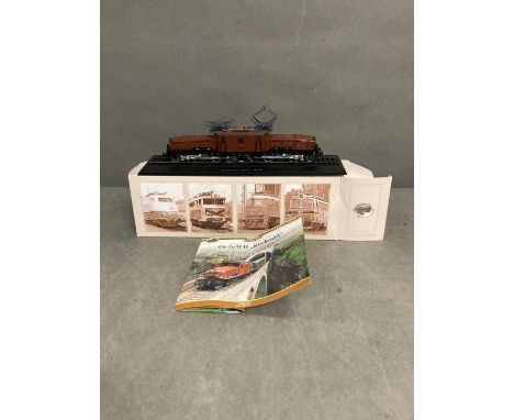 A boxed model of a CE6/8II "Krokodil" train 