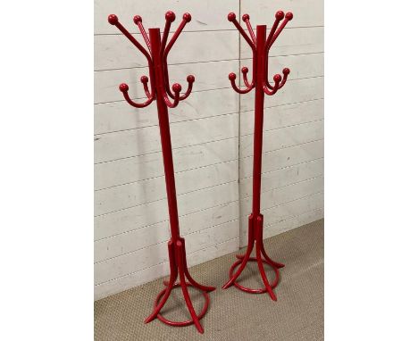 A pair of red child's coat stands (H130cm)
