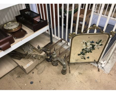 Fire dogs, mirrored brass fire screen, trivets and fire irons