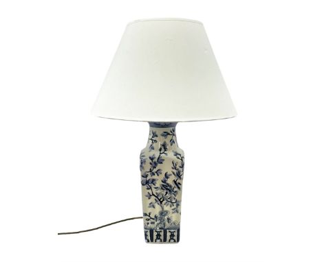 India Jane table lamp, decorated with blue birds and floral vines upon a white ground, fitted with a cream lampshade, H62cm 