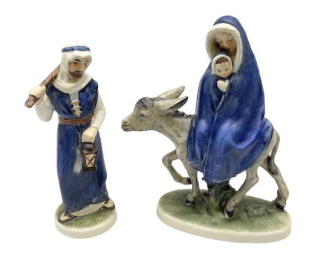 Goebel Flight Into Egypt figure group depicting Mary holding baby Jesus on donkey, no. 44405, together with another Goebel St