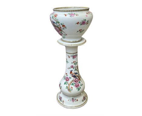 Large ceramic Jardiniere on stand, decorated with an oriental pheasant perched upon branches blossoming with peonies and foli
