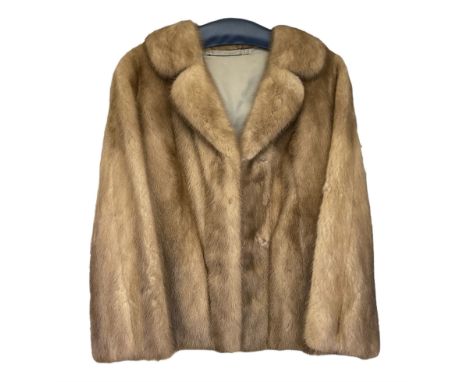 Lady's mink jacket with original shop ticket, insurance valuation dated 1982 and family presentation note