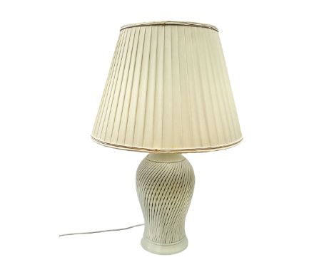 Cream table lamp of baluster form with lattice work body, with a pleated fabric lampshade, lamp without shade H50cm