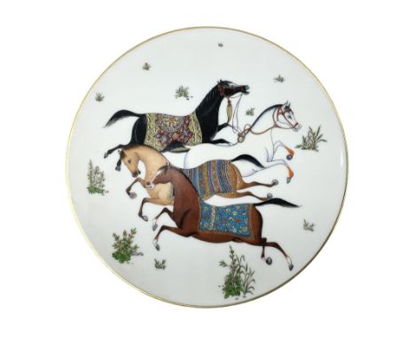 Hermes 'Cheval d'Orient' plate, decorated in the style of Persian miniatures with whimsical design of four leaping Arabian ho