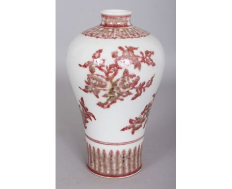 A CHINESE COPPER RED MEI PING PORCELAIN VASE, decorated with the Three Abundances of peach, finger citron and pomegranate, th