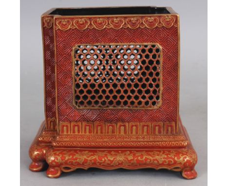 AN UNUSUAL CHINESE RED &amp; GILT DECORATED PORCELAIN BRUSHPOT, with lattice pierced sides, the base with a moulded Qianlong 