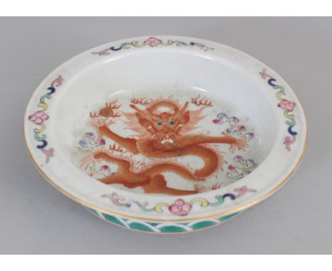 A SMALL CHINESE FAMILLE ROSE &amp; IRON-RED DECORATED DRAGON BOWL, with a flanged rim, the base with a Daoguang seal mark, 5.