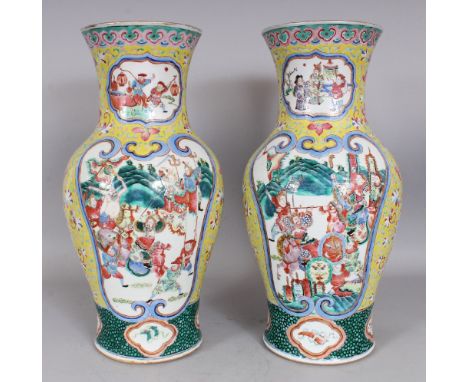 A LARGE PAIR OF 19TH CENTURY CHINESE CANTON FAMILLE ROSE YELLOW GROUND PORCELAIN VASES, each painted with scroll and ruyi bor