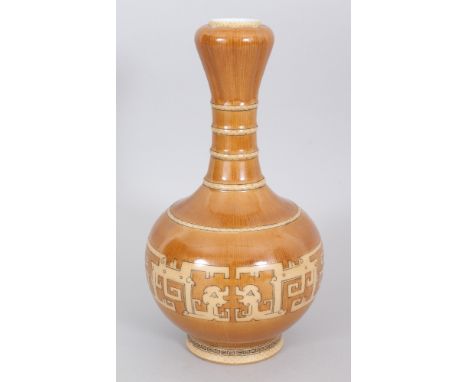 AN UNUSUAL CHINESE IMITATION BAMBOO PORCELAIN BOTTLE VASE, with an onion neck and archaic decoration, the base with a Yongzhe