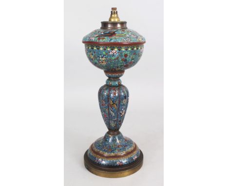 AN UNUSUAL JAPANESE MEIJI PERIOD CLOISONNE LAMP, fitted for electricity, decorated with phoenix and meandering foliage agains