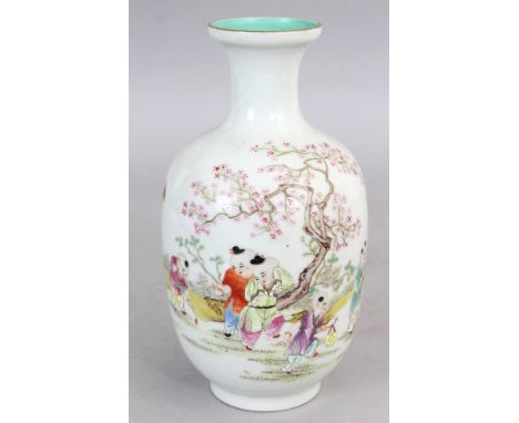 A CHINESE FAMILLE ROSE PORCELAIN VASE, decorated with a continuous scene of boys bearing lanterns, drums and musical instrume