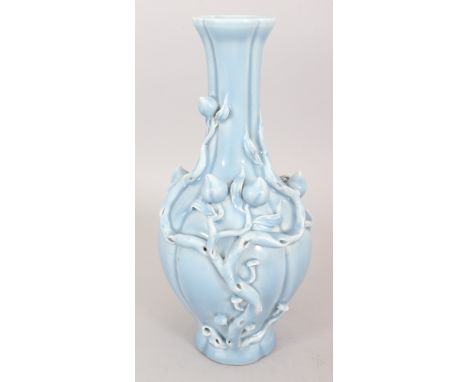 A CHINESE CLAIRE-DE-LUNE NINE PEACH MOULDED PORCELAIN VASE, the base with a Qianlong seal mark, 12.3in high.