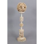 A GOOD LARGE EARLY 20TH CENTURY CHINESE CONCENTRIC SECTIONAL IVORY BALL ON STAND, weighing approx.