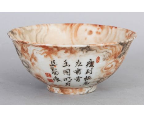 AN UNUSUAL CHINESE REPUBLIC STYLE PORCELAIN BOWL, decorated with calligraphy and with clouds in iron-red and black enamels, t