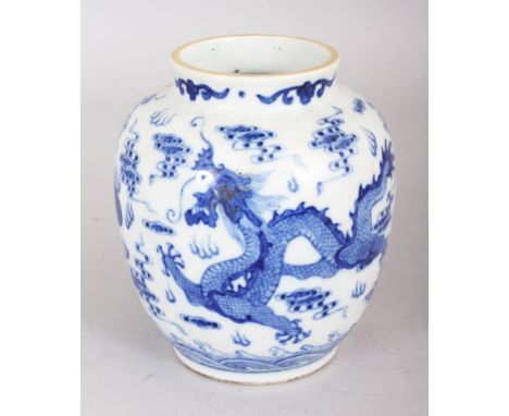 A CHINESE BLUE &amp; WHITE PORCELAIN DRAGON VASE, the base with a four-character Kangxi mark, 5.3in high.