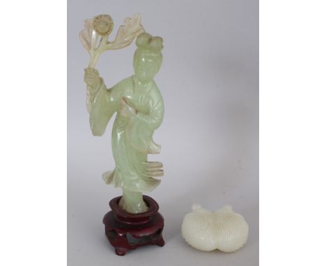 A 20TH CENTURY CHINESE CELADON BOWENITE FIGURE OF GUANYIN BEARING A FLORAL SPRAY, together with a fitted wood stand, 7in high