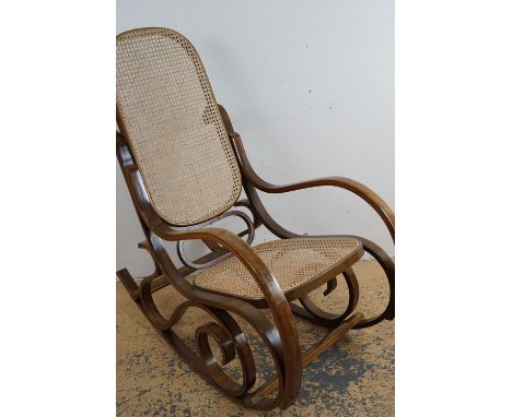 An Art Nouveau style bentwood rocking chair, circa 1960s