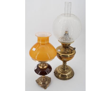 A modified brass oil lamp, 54 cm (a/f) and one other similar, 37 cm (a/f) 
