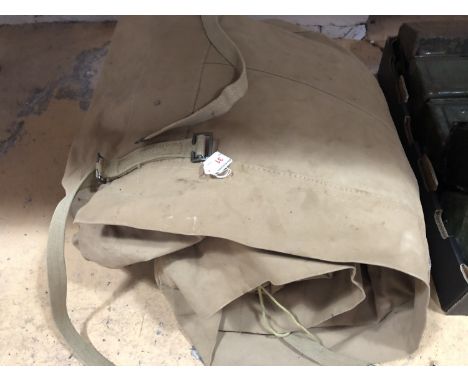 A 1940s British Army or similar canvas sleeping bag
