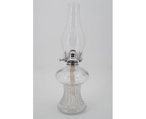 A glass oil lamp, 41 cm