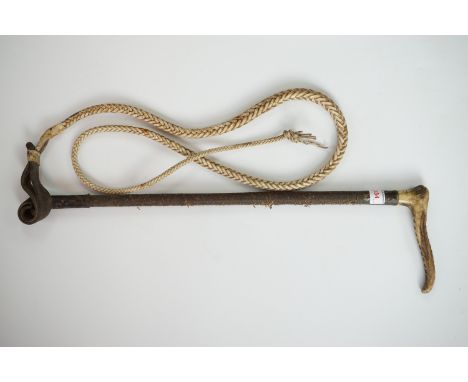 An antique antler-handled riding whip