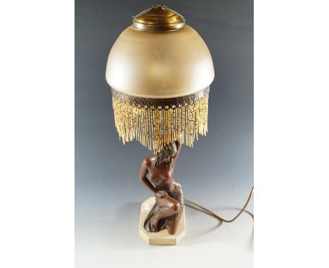 A reproduction Art Deco figural table lamp, 66 cm high