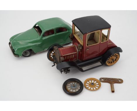 A Schuco tinplate model Ford Coupe T 1917, with key, (a/f), and a Chad Valley clockwork car