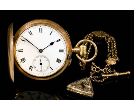 An early 20th Century gentleman's 9ct gold full hunting cased keyless lever pocket watch, No. 56890, the white enamelled dial