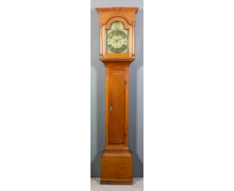 An 18th Century oak longcase clock by John Nash of Bridge, the 12ins arched brass dial with wide chapter ring (formerly silve