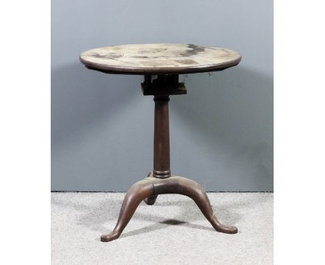 An 18th Century mahogany circular tripod table with plain top, on birdcage and plain turned central column with cabriole legs