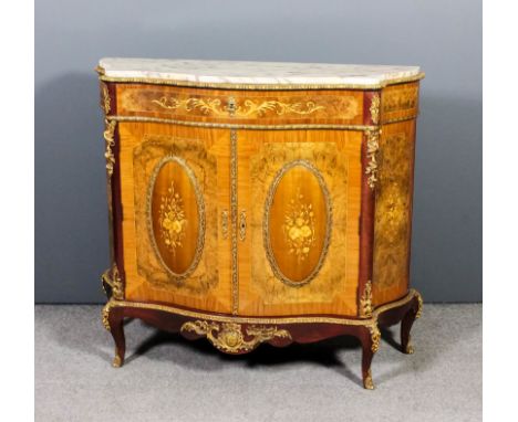 A 20th Century French kingwood and walnut and gilt metal mounted serpentine fronted commode with white flecked marble slab to