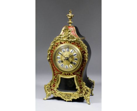 A late 19th/early 20th Century French tortoise-shell, Boulle and gilt brass mounted mantel clock of Louis XV design, by S. Ma