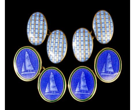 A pair of modern gentleman's silver gilt and blue enamel cufflinks, the oval faces with blue guilloche enamel with the profil