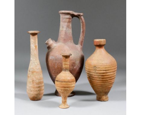 A Roman pottery Unquentarium, 8.25ins high, a small pottery vase with red and black horizontal coloured banding, 6.25ins high