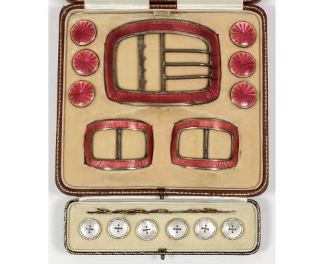 A  set of early 20th Century gentleman's 9ct gold mother of pearl and enamel cased dress buttons in blue leather and gilt too