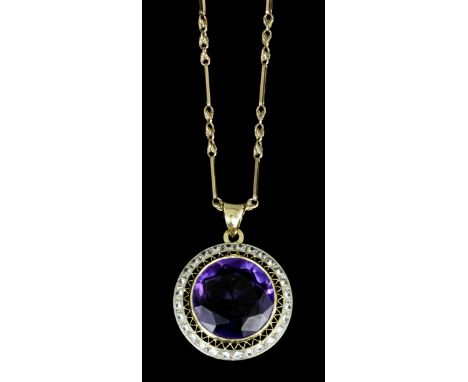 A modern gold coloured metal mounted amethyst and diamond set target pattern pendant, the 20mm diameter circular cut amethyst
