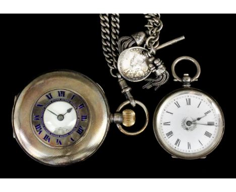 An early 20th Century gentleman's silver half hunting cased keyless pocket watch, retailed by James Walker of London, the whi