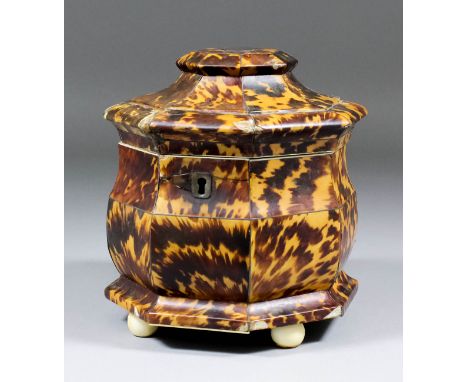 A 19th Century tortoiseshell and ivory octagonal tea caddy, 5.5ins wide x 6.75ins high, (damaged)