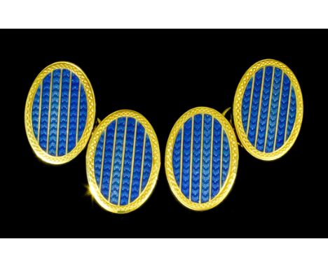 A pair of modern gentleman's 18ct gold and enamel cufflinks, the oval faces with alternating bands of gold and blue guilloche