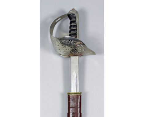 A George V officers dress sword by Wilkinson of Pall Mall, No 4890, the 33ins re-polished blade with makers name and royal cy